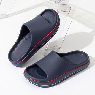 Comfortable navy blue slides with red accents. Casual slip-on sandals perfect for summer relaxation or outdoor activities.