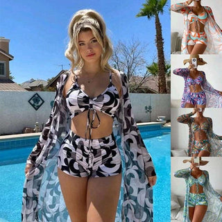 Fashionable floral bikini with long cardigan for a chic summer beach look
