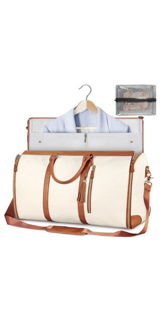 Stylish beige travel duffle bag with leather trim, suitable for carrying clothes and accessories for a trip. The bag features a spacious main compartment, additional pockets, and a hanging hook for convenient organization.