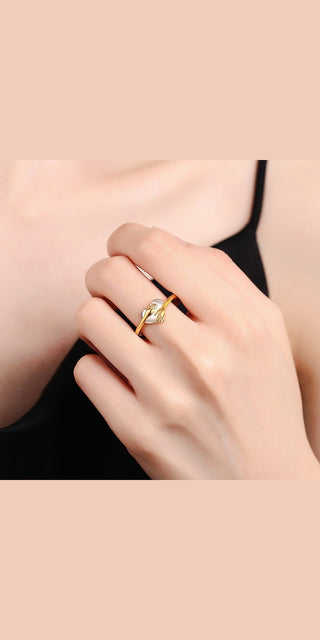 Heart-shaped ring with simple gold accents, elegant fashion accessory