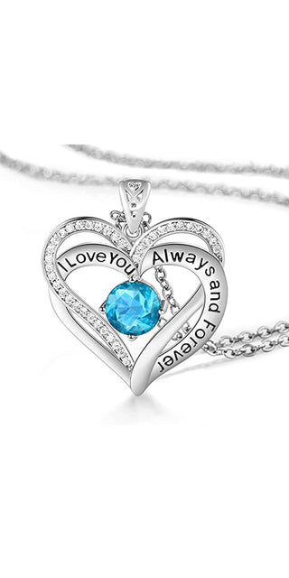 Sparkling heart-shaped crystal necklace with "I Love You Always" engraving, showcased on a minimalist background.