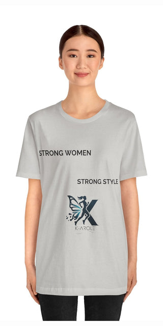 Stylish gray t-shirt with motivational text and butterfly graphic design, showcasing a young woman's confident expression.