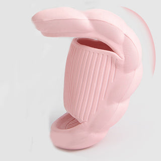 Pink wave-patterned women's slippers with a non-slip bathroom design