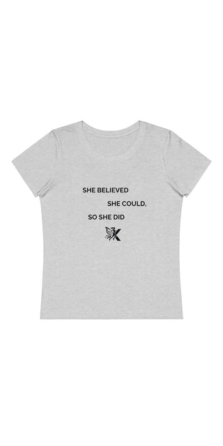 Soft gray women's t-shirt with minimalist text graphic. Simplistic design featuring the quote "She believed she could, so she did" along with a small symbolic icon.