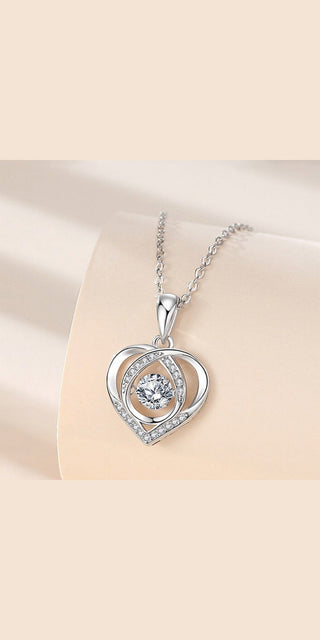 Luxurious heart-shaped pendant necklace with sparkling rhinestones, a beautiful gift for the fashion-conscious woman.