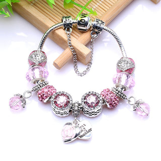 Pink crystal bracelet with charms and pendants, a stylish Mother's Day gift.