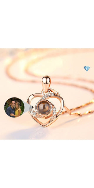 Shimmering heart-shaped pendant necklace with photo projection feature, a thoughtful accessory to capture cherished moments.