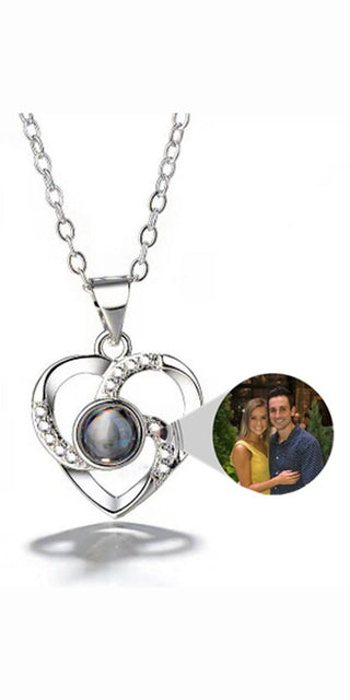 Elegant silver-toned heart-shaped pendant necklace with photo projection feature, perfect for capturing cherished memories at K-AROLE.