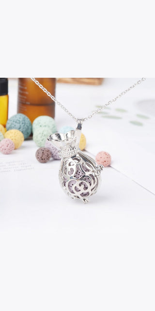 Elegant Aromatherapy Necklace: Intricate Silver Pendant Diffuses Fragrance with Style