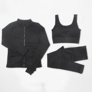 Sleek black workout set featuring a jacket, sports bra, and leggings, providing a stylish and comfortable athleisure look.