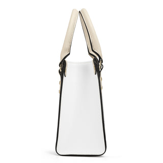 Stylish women's luxury PU handbag with sleek design and contrasting black and off-white color scheme, showcased on a plain white background.