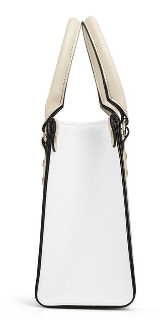Stylish women's beige leather handbag with black trim and handles, featuring a modern and functional design for everyday use.