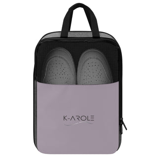 Stylish breathable mesh sneakers in a gray and black color palette, showcased in a sleek and modern carrying case from the K-AROLE brand.
