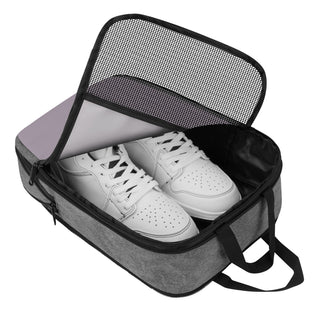 Stylish and versatile mesh sneakers for women, showcased in an open shoe storage bag. The breathable mesh design and chunky sole provide both comfort and fashion-forward appeal. The product's features are highlighted through its placement in the organized storage bag, making it an ideal choice for the active, fashionable woman.