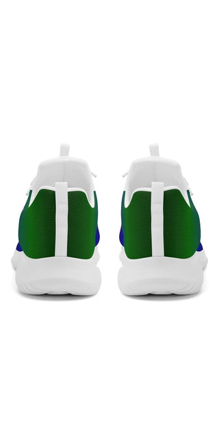 Stylish women's running shoes in white and green with lace-up front design from K-AROLE. The shoes feature a modern, sporty look and are perfect for your active lifestyle.