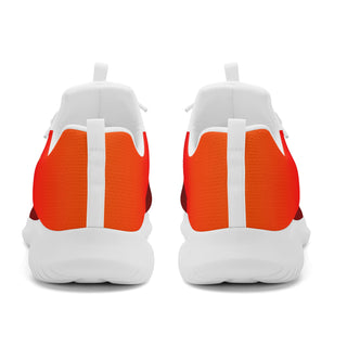 Vibrant orange and white women's running shoes from K-AROLE, featuring a modern, sporty design and comfortable construction for an active lifestyle.