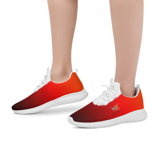Stylish red and white sneakers with a modern design, featuring a sleek silhouette and vibrant coloring. The sneakers have a laced closure for a secure fit and appear to be comfortable and suitable for everyday wear.