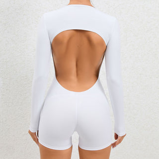 Sleek white backless long-sleeve yoga jumpsuit with open back design