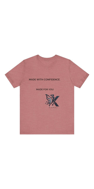 Soft pink unisex jersey short sleeve t-shirt with "Made with Confidence. Made for You." text and butterfly graphic design.