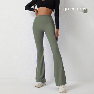 High waist yoga leggings in trendy green gray color, showcased on a female model's lower body against a plain white background.