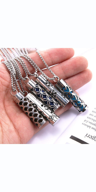 Elegant aromatherapy pendant necklaces with stainless steel chains, featuring intricate patterns and designs for a stylish, fragrant accessory.