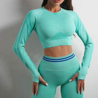 Mint green seamless yoga top and leggings from K-AROLE, featuring a cropped design and ribbed details for a comfortable and stylish workout outfit.