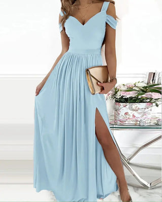 Elegant blue maxi dress with floral print, tie-waist, and off-the-shoulder design.