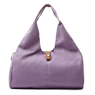 Fashionable lavender-colored hobo bag with leather details and a versatile design for women's sports, travel, and weekend activities.