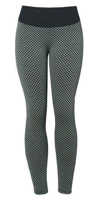 Stylish women's high-waist leggings with a black and white dot pattern, designed for fitness and yoga activities.