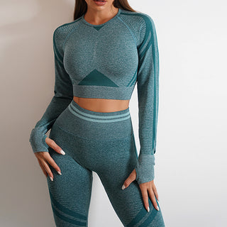 Stylish green seamless sports crop top and leggings set - coordinated activewear for modern fitness fashion.