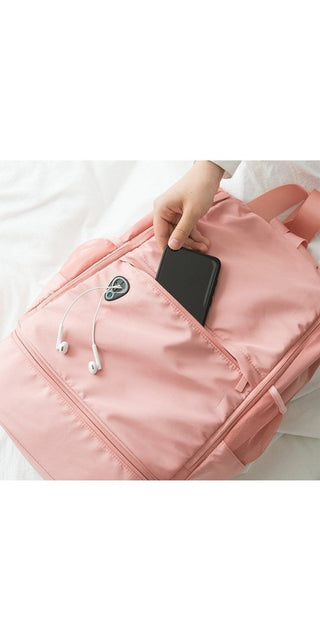 Stylish pink backpack with modern organizational design and handy compartments for storing personal items, phone, and other essentials for sports or travel.