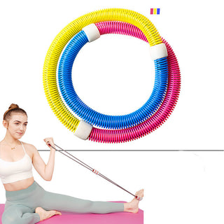 Colorful fitness hoop workout equipment for home use. The ring-shaped hoop is composed of bright yellow, blue, and pink flexible segments, suitable for physical activity and weight loss. The image shows the hoop against a plain background, along with a person demonstrating its use during a fitness routine.