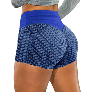 Women's breathable, stretchy athletic shorts in a stylish color block design, featuring a comfortable elastic waistband and textured fabric for an active lifestyle.