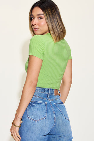 Lime green ribbed round neck short sleeve T-shirt on model with long brown hair, against plain white background