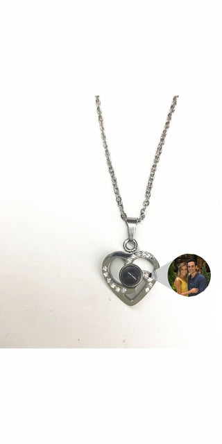 Elegant S925 silver heart-shaped pendant necklace with colorful photo projection, adorned with sparkling crystals, perfect for stylish accessories.