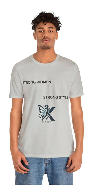 Unisex jersey short sleeve t-shirt with bold "Strong Women Strong Style" text and butterfly graphic design, worn by a young man with curly hair against a plain background.