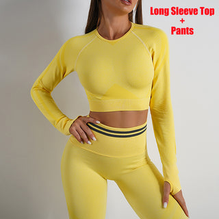 Yellow cropped long sleeve top and matching leggings, stylish workout ensemble