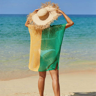 Straw sun hat, green mesh beach cover-up, tropical beach scene