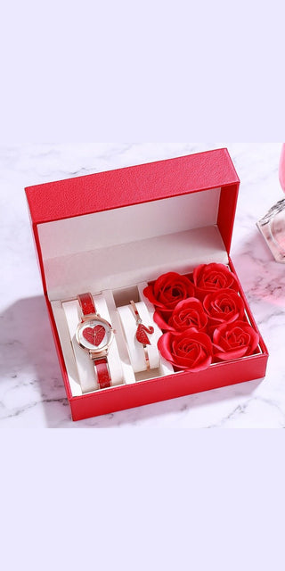 Elegant red gift set: leather watch, floral arrangement, and heart-shaped accessories for a stylish Valentine's Day gift from K-AROLE.