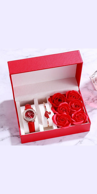 Elegant ladies' Valentine's Day gift set: red roses, stylish wristwatch, and delicate jewelry pieces in a sleek red presentation box.