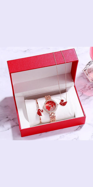 Elegant Valentine's Day jewelry set with heart-shaped pendant and bracelet in red gift box