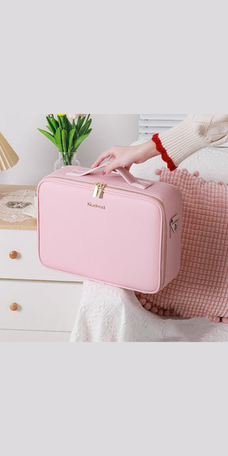 Stylish pink travel makeup bag with ample storage space, perfect for organized cosmetics on-the-go.