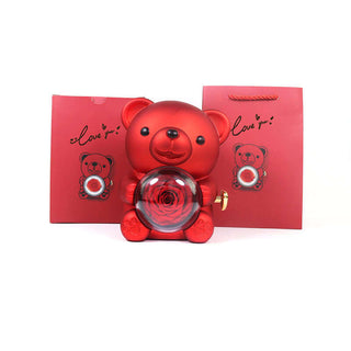 Rotating Eternal Flower Ring Necklace Packaging Box - a red heart-shaped gift box with a rose and decorative stuffed teddy bears, showcasing the product's elegant packaging and presentation.