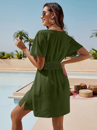 Fashionable olive green dress with puff sleeves and a flattering silhouette, perfect for a poolside getaway