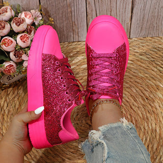 Bright pink glitter sequin sneakers with thick soles and lace-up design, perfect for casual, trendy style and skateboarding.