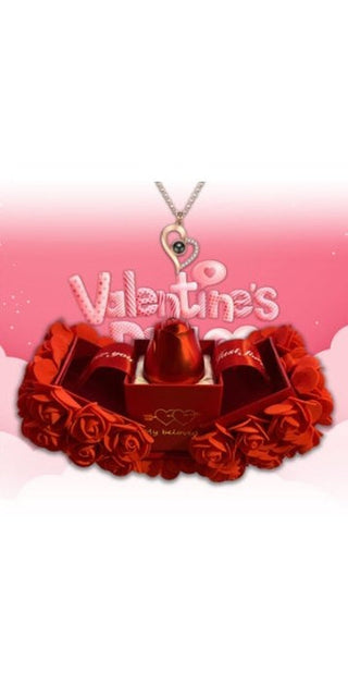 Elegant heart-shaped necklace atop a bed of lush red roses, perfect Valentine's Day gift for the special lady.