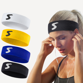 Colorful fitness headbands in various shades of white, yellow, and blue, worn by an active woman with her eyes closed, indicating a focused workout.