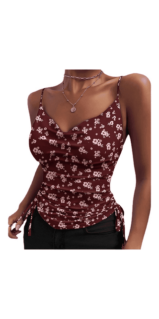 Floral print camisole top with adjustable spaghetti straps, featuring a v-neck design and ruched detailing, displayed on a female mannequin.