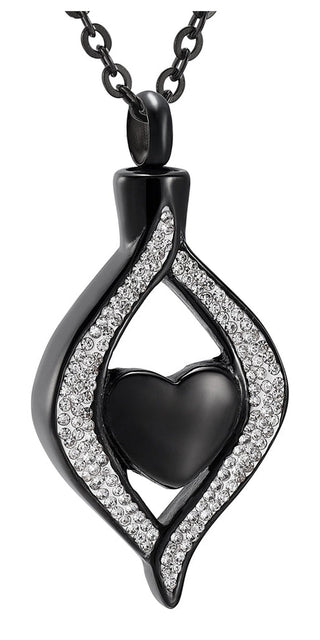Elegant black titanium steel heart pendant with sparkling crystal accents, suspended on a sturdy chain. Chic and sophisticated jewelry piece from the K-AROLE collection.