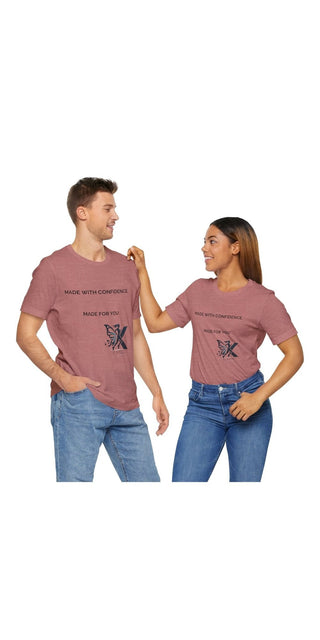 Stylish couple wearing casual t-shirts with a printed design. The t-shirts appear to be part of an apparel collection or brand. The man and woman are posing together in relaxed, friendly poses, showcasing the trendy t-shirt designs.